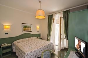 TV a/nebo společenská místnost v ubytování Hotel Kyrton