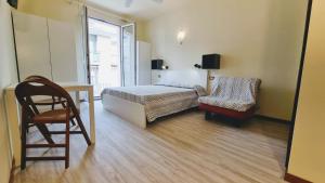 Postel nebo postele na pokoji v ubytování Residence Rosa