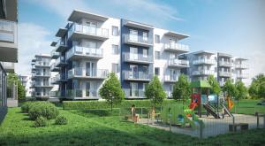een weergave van een appartementencomplex met een speeltuin bij Apartament Amber Comfort z prywatnym miejscem parkingowym in Kołobrzeg