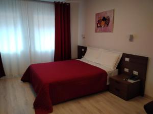 Postel nebo postele na pokoji v ubytování Hotel Cajeta