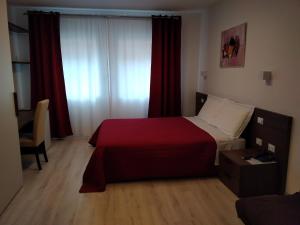 Postel nebo postele na pokoji v ubytování Hotel Cajeta