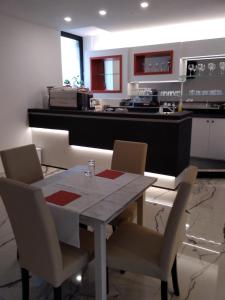 Kuchyň nebo kuchyňský kout v ubytování Hotel Cajeta