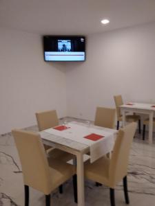 TV a/nebo společenská místnost v ubytování Hotel Cajeta