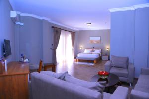Postel nebo postele na pokoji v ubytování Haile Resort Adama