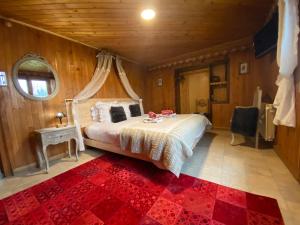 Llit o llits en una habitació de Chalet Génépi