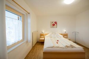 Katil atau katil-katil dalam bilik di Kristallhof Fewo Golden