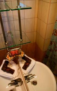 Ванна кімната в Iliovasilema Hotel