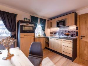 A cozinha ou kitchenette de Dorfkaiser Appartements