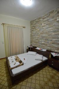 Posteľ alebo postele v izbe v ubytovaní Zambia Apartments
