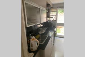 Nhà bếp/bếp nhỏ tại Espectacular departamento en el corazón de Martinez +10 ảnh