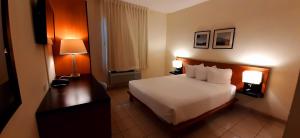 Ένα ή περισσότερα κρεβάτια σε δωμάτιο στο Comfort Inn Real La Union