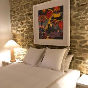 Postel nebo postele na pokoji v ubytování La Gotale - Maison d' Amis