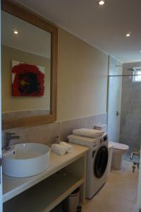 Koupelna v ubytování Maka Bay Self Catering + 37 fotografií