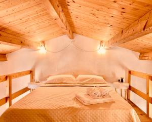 En eller flere senge i et værelse på Tenuta Blancamar Country Bed & Breakfast