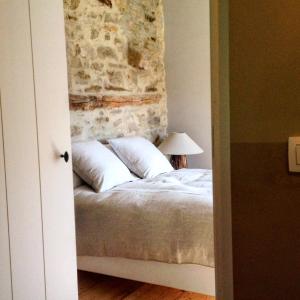 Postel nebo postele na pokoji v ubytování La Gotale - Maison d' Amis