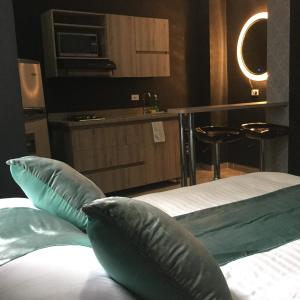 Letto o letti in una camera di Apartahotel Avanti