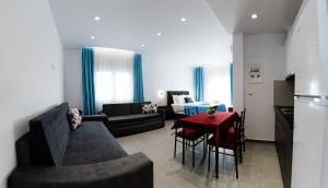 Posezení v ubytování Athena Center Apartments