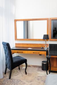 TV a/nebo společenská místnost v ubytování Sky Hotel Kraków