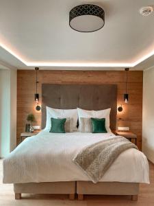 Ένα ή περισσότερα κρεβάτια σε δωμάτιο στο Boutiquehotel - Michl