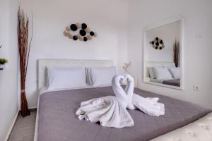 Postel nebo postele na pokoji v ubytování Blue Soul Luxury Villa + 37 fotografií
