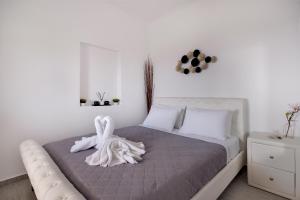 Postel nebo postele na pokoji v ubytování Blue Soul Luxury Villa