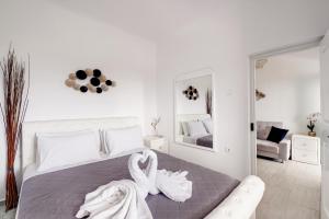 Postel nebo postele na pokoji v ubytování Blue Soul Luxury Villa