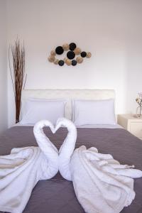 Postel nebo postele na pokoji v ubytování Blue Soul Luxury Villa