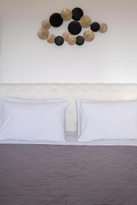 Postel nebo postele na pokoji v ubytování Blue Soul Luxury Villa