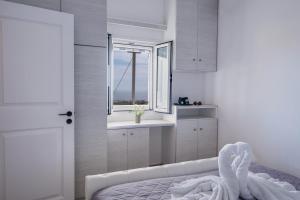 Postel nebo postele na pokoji v ubytování Blue Soul Luxury Villa