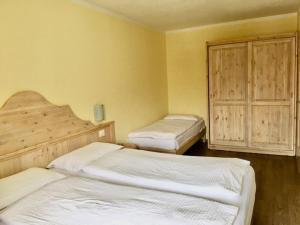 Postel nebo postele na pokoji v ubytování Appartamenti Sissi