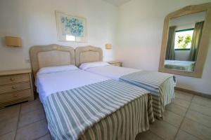 Posteľ alebo postele v izbe v ubytovaní Bungalow Villa Verde 2