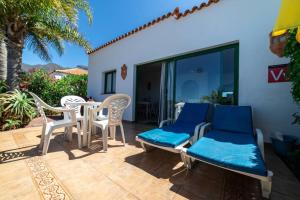 Patio alebo iná vonkajšia časť ubytovania Bungalow Villa Verde 2