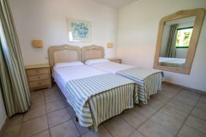 Posteľ alebo postele v izbe v ubytovaní Bungalow Villa Verde 2