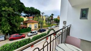a balcony with a view of a street with cars at Ressa Apart in Marmaris
