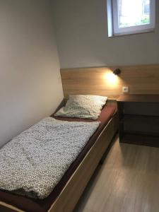 Postel nebo postele na pokoji v ubytování Beregi Apartman