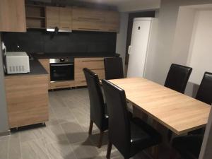 Kuchyň nebo kuchyňský kout v ubytování Beregi Apartman