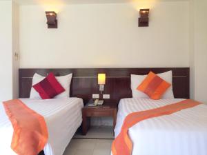 Voodi või voodid majutusasutuse Evergreen Resort toas