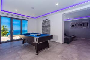 โต๊ะบิลเลียดของ Villa Belvedere with heated pool, billiards, Media room, sea views,10 pax