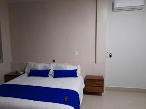 Voodi või voodid majutusasutuse Grand View Suites toas