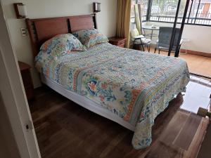 Ένα ή περισσότερα κρεβάτια σε δωμάτιο στο Avenida del Mar , Primera Linea, edificio Canto del agua