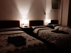 Posteľ alebo postele v izbe v ubytovaní Habitaciones La MAR