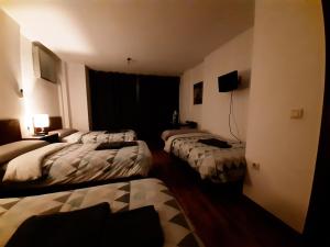 Posteľ alebo postele v izbe v ubytovaní Habitaciones La MAR