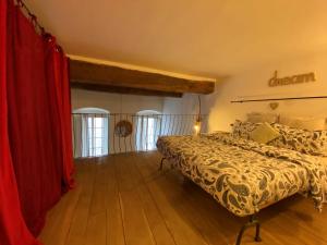 A bed or beds in a room at Gioielli Di Priori