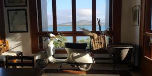 Posezení v ubytování Villa Curiazzi Guesthouse Viale la Pelosa 16