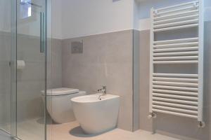 Koupelna v ubytování Villa Curiazzi Guesthouse Viale la Pelosa 16