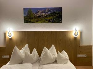 Letto o letti in una camera di Der Brückenhof Ramsau