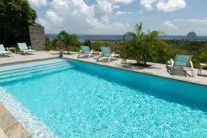 La alberca dentro o cerca de Kaz O'Rocher - Sea View Appartements