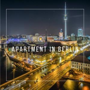 a city at night with the words experiment in berlin at Apartment im Zentrum Berlin Kudamm, City West in Berlin