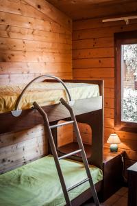 Двухъярусная кровать или двухъярусные кровати в номере Il Veliero