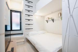 Cama o camas de una habitación en REAL 早稻田